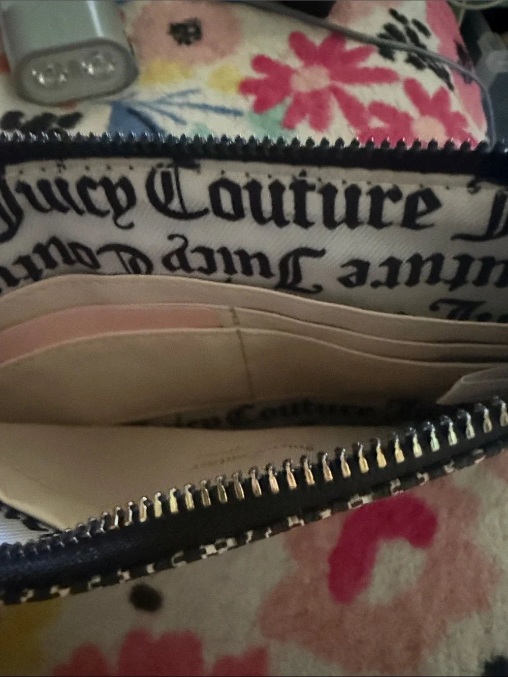 Juicy Couture Black & White Logo Zip Wristlet with Gold Plaque